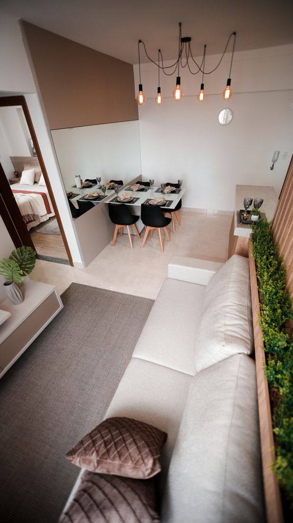 A contemporary dining area with stylish decor and comfortable seating for a homely feel.